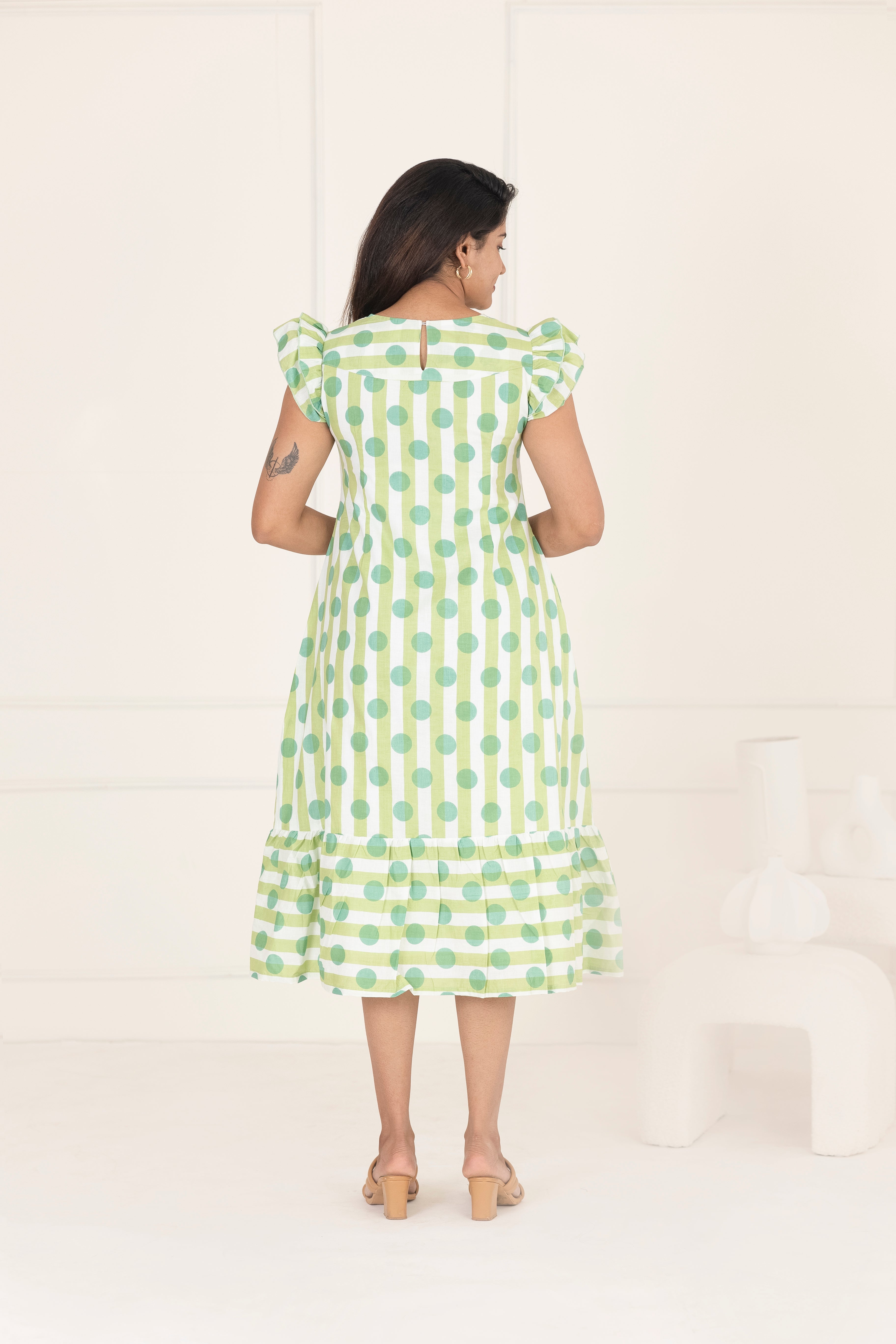 Green polka dress