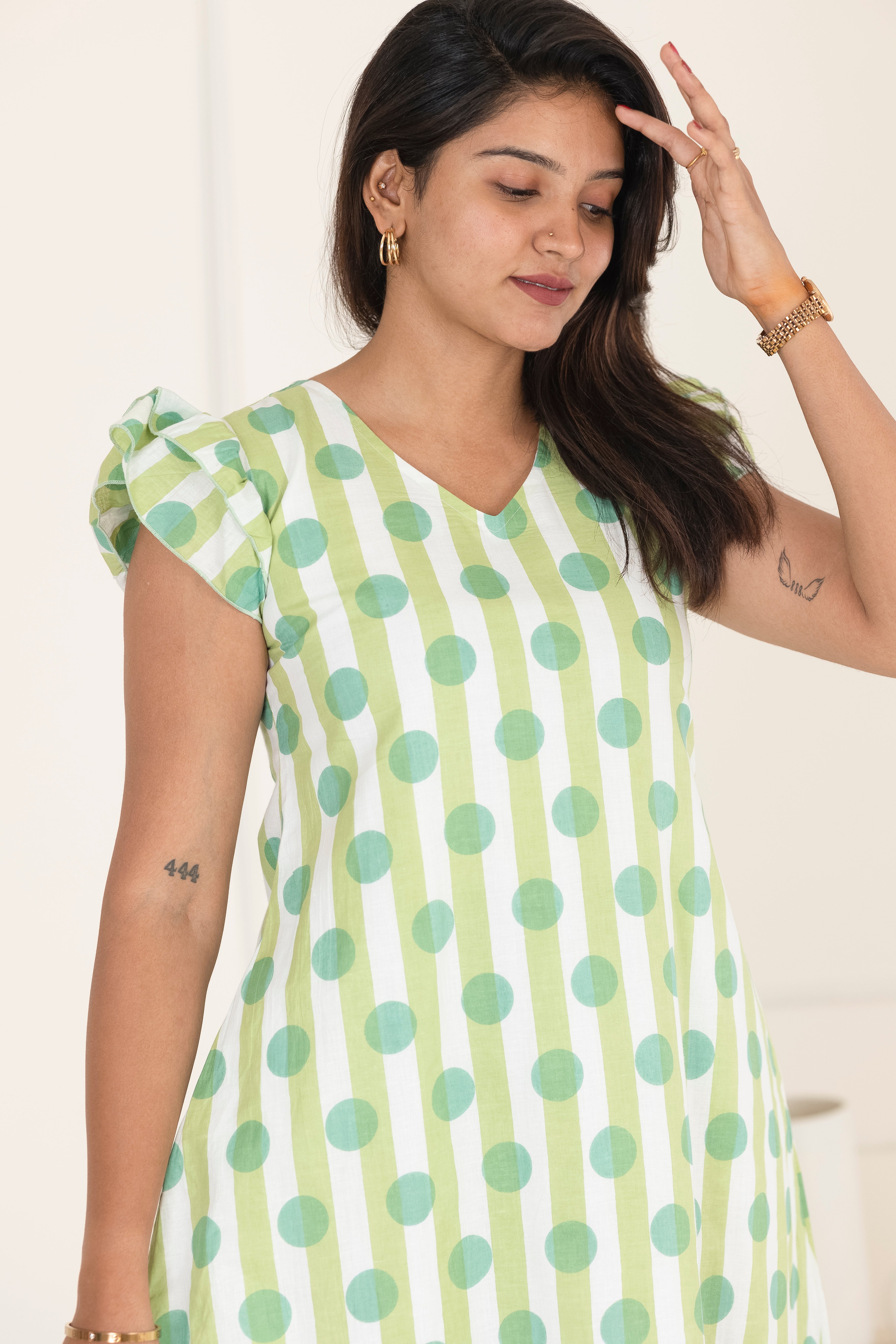 Green polka dress
