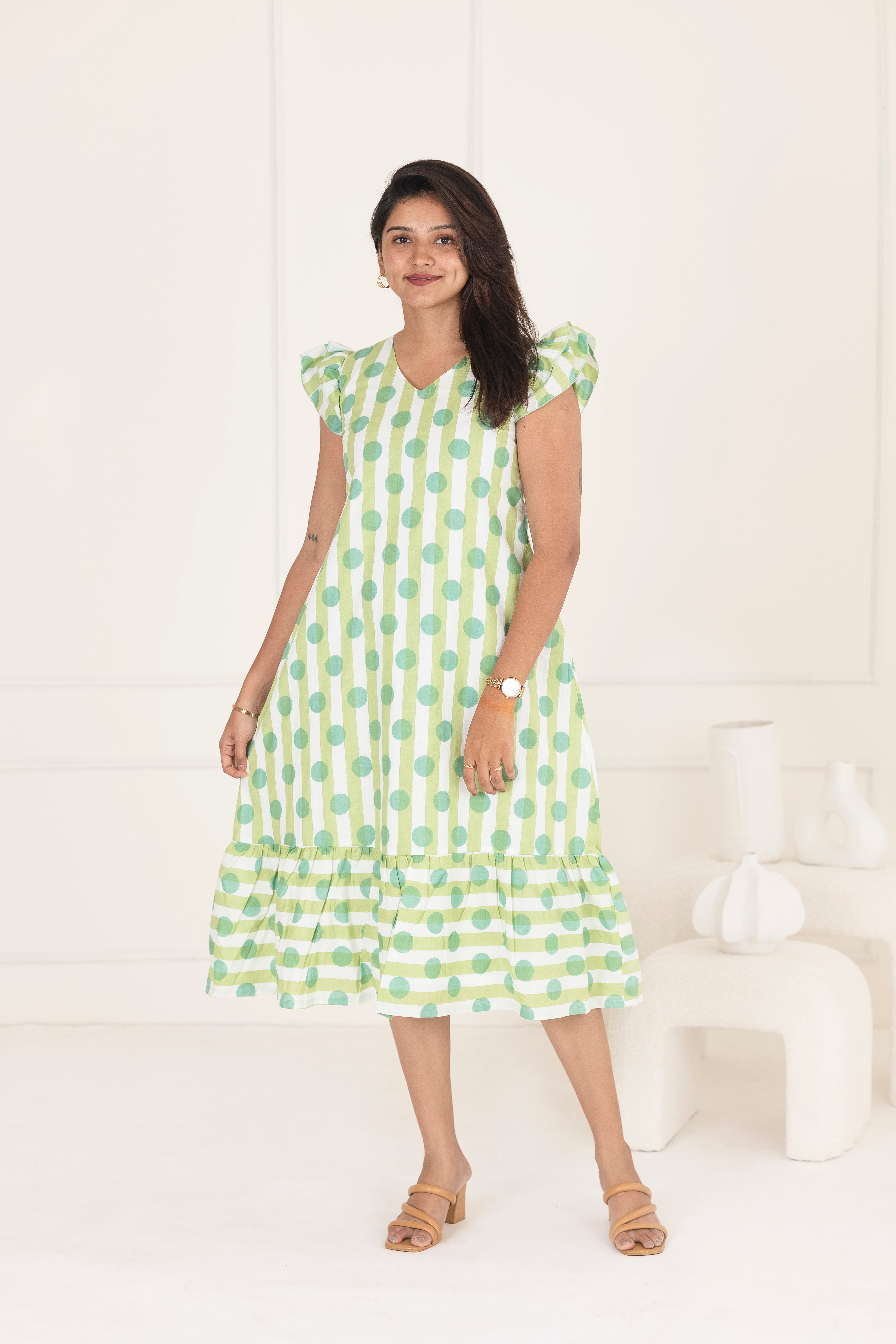 Green polka dress