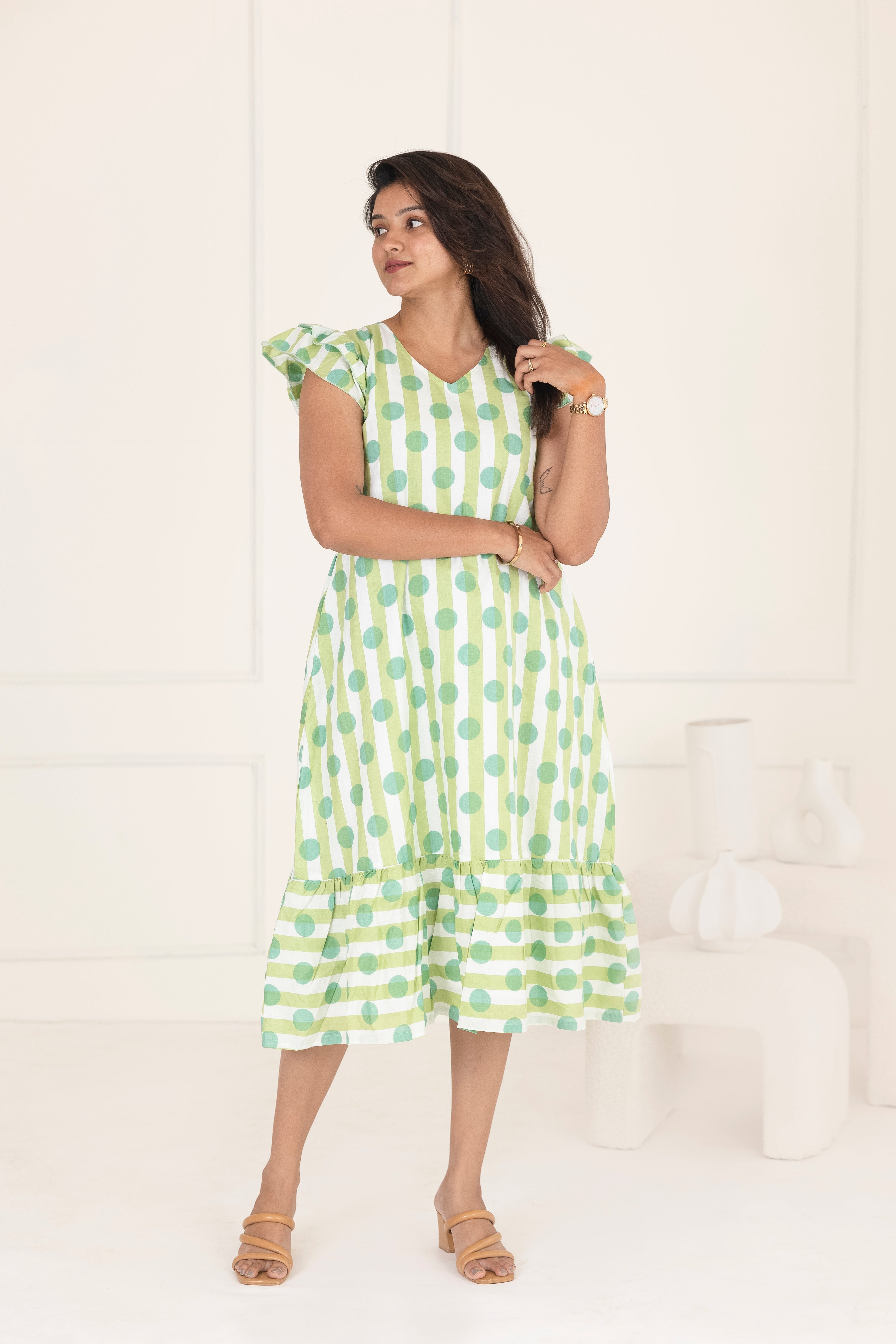 Green polka dress