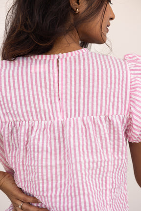 Pink checks top